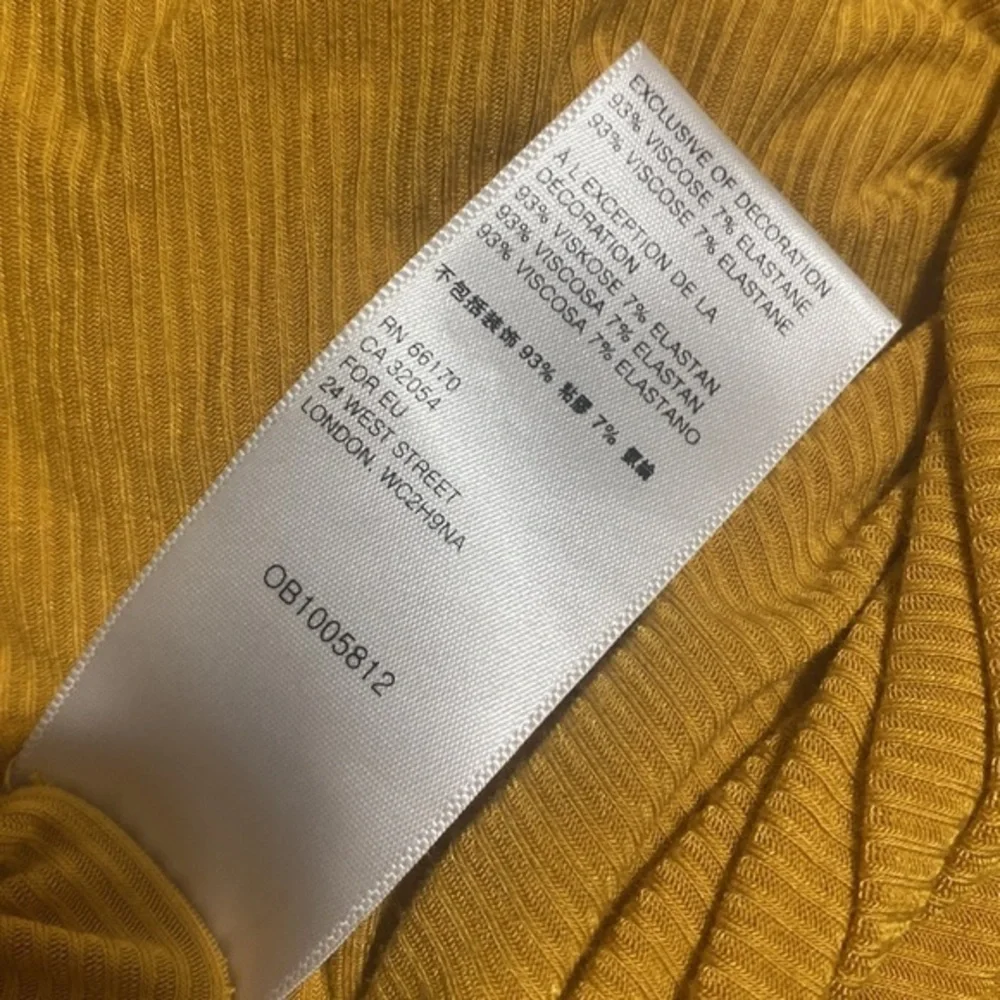 Free People Shimmy Shake Ribbed Top in Untamed Gold Size‎ Medium